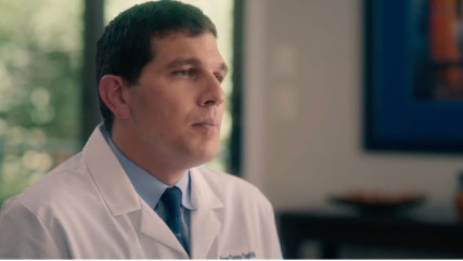 Video play button featuring an image of Dr.Yasar Torres-Yaghi